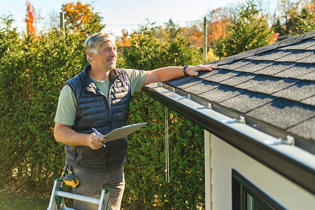 Professional Roofing technician working in Basom, NY